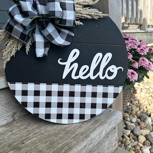 Rustic Buffalo Plaid “Hello” Door Hanger | Farmhouse Front Porch Decor | Round Wood Welcome Sign with Bow
