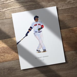 May include: A print of a baseball player in a Boston Red Sox uniform, swinging a bat. The player is wearing a helmet, sunglasses, and batting gloves. The print is on white paper, with the text "#34 DAVID ORTIZ // BOSTON RED SOX" and a signature.