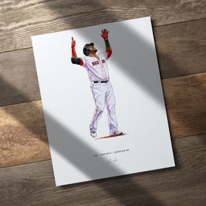 May include: Illustration of a baseball player in a white uniform with red accents, arms raised in celebration. The player wears a black helmet and has tattoos on his arms. The text "RED SOX" is visible on the jersey. The artwork is on a white background.