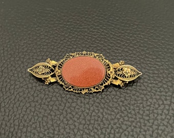 Vintage Ornate Gold-tone Metal Brooch Beautiful Speckled Oval Stone Goldstone