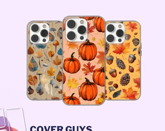 May include: Three phone cases with autumn-themed designs. One features mushrooms and leaves, another has pumpkins and maple leaves, and the third showcases acorns, pinecones, and leaves. The cases are in shades of beige, orange, and yellow.