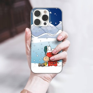 Custodia invernale per telefono Snoopy Charlie Brown in gel TPU per iPhone 16e, 17 Pro Max, 17 Air, 15 Samsung S25 Edge, S24, S23, A16, Pixel 10, 9A, 8 immagine 7