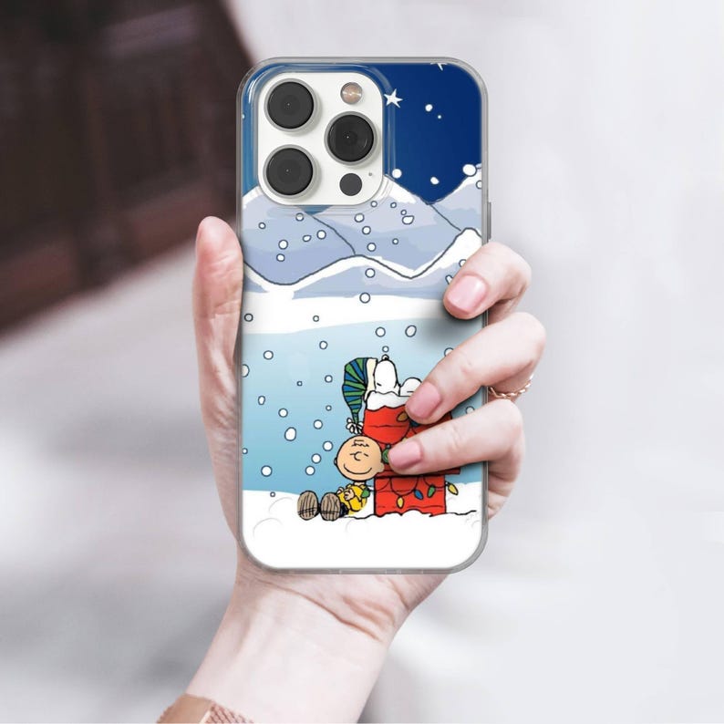 Custodia invernale per telefono Snoopy Charlie Brown in gel TPU per iPhone 16e, 17 Pro Max, 17 Air, 15 Samsung S25 Edge, S24, S23, A16, Pixel 10, 9A, 8 immagine 7