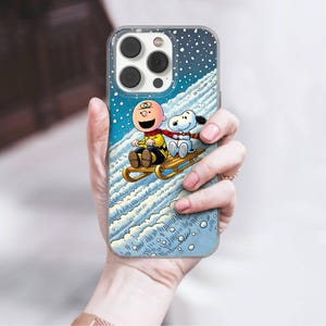 Custodia invernale per telefono Snoopy Charlie Brown in gel TPU per iPhone 16e, 17 Pro Max, 17 Air, 15 Samsung S25 Edge, S24, S23, A16, Pixel 10, 9A, 8 immagine 5