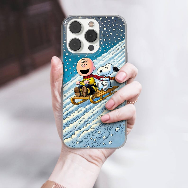 Custodia invernale per telefono Snoopy Charlie Brown in gel TPU per iPhone 16e, 17 Pro Max, 17 Air, 15 Samsung S25 Edge, S24, S23, A16, Pixel 10, 9A, 8 immagine 5