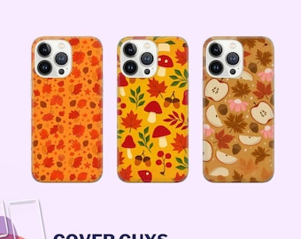 May include: Three phone cases with autumnal designs. One case features orange leaves, another has mushrooms and leaves on a yellow background, and the third displays apples and leaves on a brown background. The text "COVER GUYS" is at the bottom.