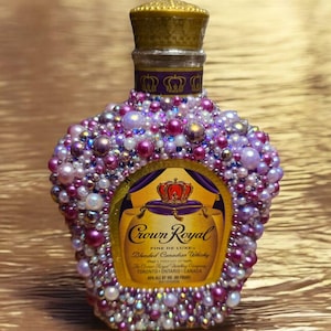 Crown Jewel: Unique Empty Crown Royal Bottle Adorned with Purple Pearls & Sparkling Rhinestones – A Chic Statement Piece