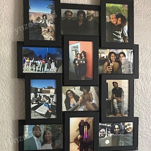 May include: A collage of black picture frames arranged in a cluster on a wall. Each frame contains a photograph, showcasing various people and scenes. The frames are rectangular and create a visually appealing display.