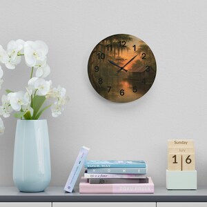 Bayou Sunset Acrylic Wall Clock, Louisiana Art, Rustic Swamp Cabin Art, Nature Print
Warm evening light filters across moss-draped cypress and a quiet swamp cabin on this acrylic wall clock. The soft, painterly scene brings a calm, reflective mood to a living room, reading nook, or bayou cottage. Lightweight yet durable, the glossy acrylic face keeps the colors rich while the easy keyhole slot on the back makes mounting effortless.