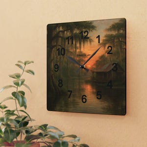 Bayou Sunset Acrylic Wall Clock, Louisiana Art, Rustic Swamp Cabin Art, Nature Print
Warm evening light filters across moss-draped cypress and a quiet swamp cabin on this acrylic wall clock. The soft, painterly scene brings a calm, reflective mood to a living room, reading nook, or bayou cottage. Lightweight yet durable, the glossy acrylic face keeps the colors rich while the easy keyhole slot on the back makes mounting effortless.