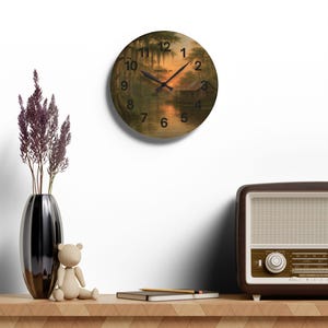 Bayou Sunset Acrylic Wall Clock, Louisiana Art, Rustic Swamp Cabin Art, Nature Print
Warm evening light filters across moss-draped cypress and a quiet swamp cabin on this acrylic wall clock. The soft, painterly scene brings a calm, reflective mood to a living room, reading nook, or bayou cottage. Lightweight yet durable, the glossy acrylic face keeps the colors rich while the easy keyhole slot on the back makes mounting effortless.