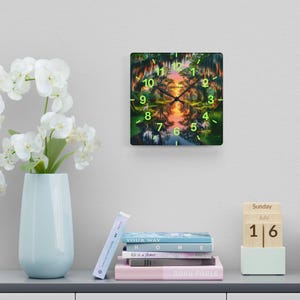Mossy Bayou Sunset Acrylic Wall Clock | Swamp Herons, Spanish Moss

Floating sunlight slips between cypress trunks as herons stand watch — this acrylic wall clock brings a quiet bayou morning into your room. Lightweight yet sturdy, the glossy print keeps colors rich so the sunrise and moss-draped branches glow against the clock face.