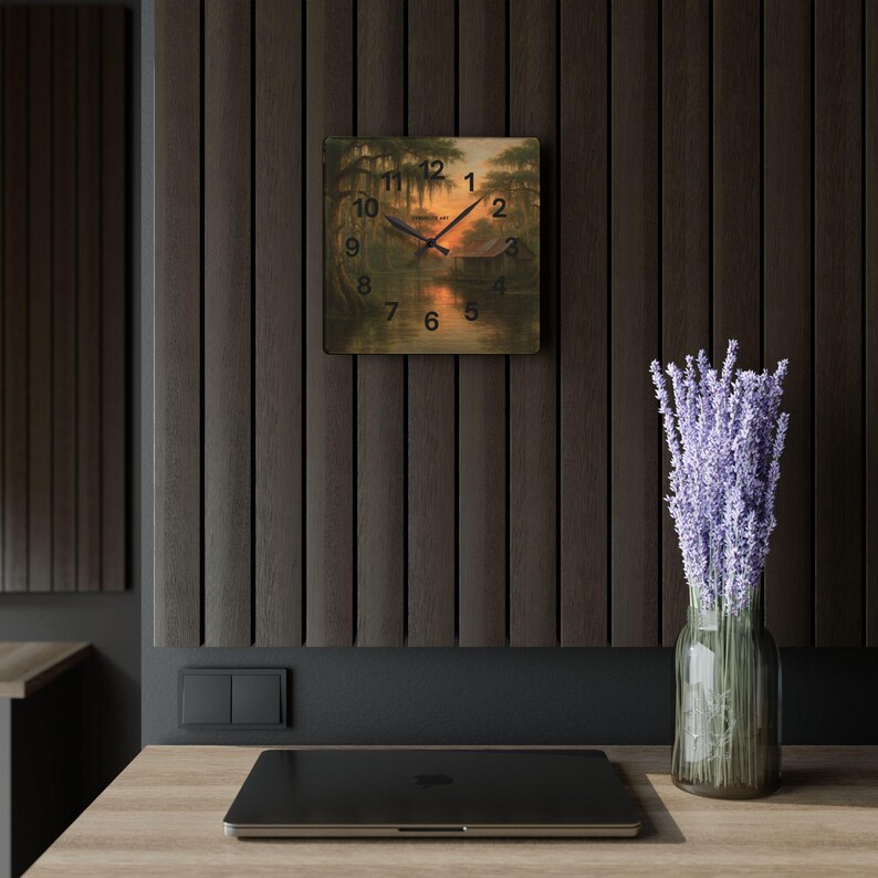 Bayou Sunset Acrylic Wall Clock, Louisiana Art, Rustic Swamp Cabin Art, Nature Print
Warm evening light filters across moss-draped cypress and a quiet swamp cabin on this acrylic wall clock. The soft, painterly scene brings a calm, reflective mood to a living room, reading nook, or bayou cottage. Lightweight yet durable, the glossy acrylic face keeps the colors rich while the easy keyhole slot on the back makes mounting effortless.