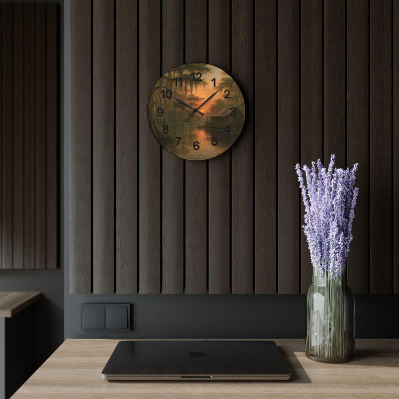Bayou Sunset Acrylic Wall Clock, Louisiana Art, Rustic Swamp Cabin Art, Nature Print
Warm evening light filters across moss-draped cypress and a quiet swamp cabin on this acrylic wall clock. The soft, painterly scene brings a calm, reflective mood to a living room, reading nook, or bayou cottage. Lightweight yet durable, the glossy acrylic face keeps the colors rich while the easy keyhole slot on the back makes mounting effortless.