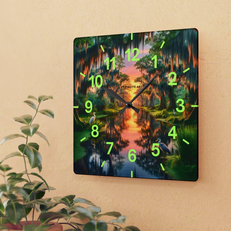 Mossy Bayou Sunset Acrylic Wall Clock | Swamp Herons, Spanish Moss

Floating sunlight slips between cypress trunks as herons stand watch — this acrylic wall clock brings a quiet bayou morning into your room. Lightweight yet sturdy, the glossy print keeps colors rich so the sunrise and moss-draped branches glow against the clock face.