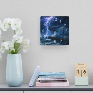 Stormy Carolina Lighthouse Acrylic Wall Clock

Bring the wild coastal sky into your room with this acrylic wall clock featuring the Stormy Carolina Lighthouse. The image captures a dramatic, wind-swept evening where waves press darkly against the rocks and the lighthouse beam slices through low clouds.