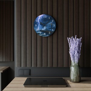 Stormy Carolina Lighthouse Acrylic Wall Clock

Bring the wild coastal sky into your room with this acrylic wall clock featuring the Stormy Carolina Lighthouse. The image captures a dramatic, wind-swept evening where waves press darkly against the rocks and the lighthouse beam slices through low clouds.