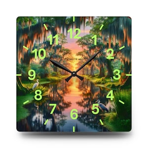 Mossy Bayou Sunset Acrylic Wall Clock | Swamp Herons, Spanish Moss

Floating sunlight slips between cypress trunks as herons stand watch — this acrylic wall clock brings a quiet bayou morning into your room. Lightweight yet sturdy, the glossy print keeps colors rich so the sunrise and moss-draped branches glow against the clock face.