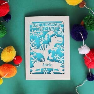 Carte de Noël personnalisée dinosaure en papier découpé, carte de Noël en papier découpé, Noël des enfants, rugissant, Dino