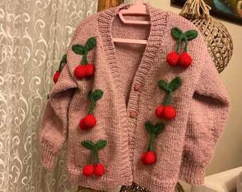 Hand-knitted baby cardigan with cherry details-soft and handmade with love