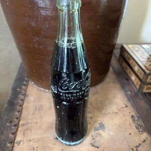 Vintage 1956 Coca-Cola Bottle – Sealed 6.5 oz Contour Glass with Original Contents – Embossed Green Glass