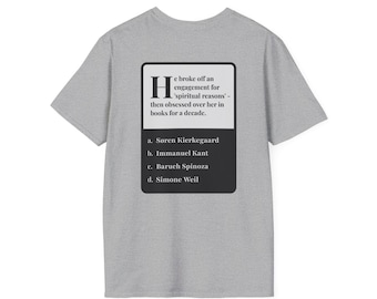 May include: A light gray t-shirt with a black rectangle graphic. The graphic includes the letter "H" and text about an engagement and books. Below are four names: Søren Kierkegaard, Immanuel Kant, Baruch Spinoza, and Simone Weil.