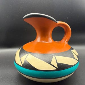 Native American hand painted by Ray Wood water pot inspired by Navajo, Hopi or Hohokam patterns.  Design features beautiful geometric lines.