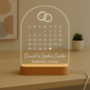 May include: A rustic wooden sign with the text "Welcome to our home" in a handwritten style. The sign features a distressed finish and a simple, inviting design, perfect for a front porch or entryway.