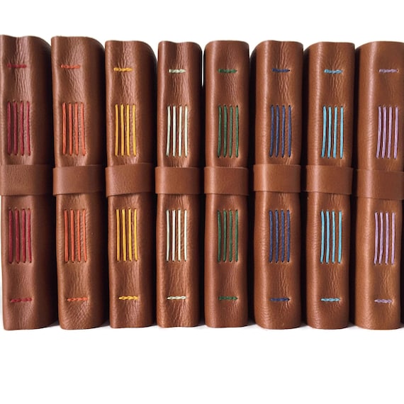 A real leather sketchbook with a monogrammed cover — 1,183 favorites signals this is a proven, well-loved gift for the artist in your life.
