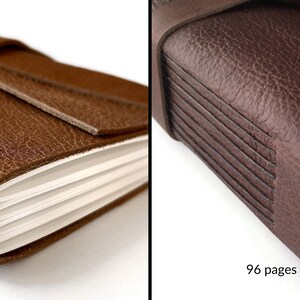 May include: Two brown leather-bound journals with a ribbon closure. The journal on the left has 48 pages and the journal on the right has 96 pages.