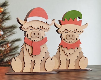 Adorno de vaca de las Highlands, archivo cortado por láser / Vaca navideña SVG / Decoración de vaca de las Highlands con Papá Noel y elfo / Corte por láser de 3 mm / Archivo de vaca navideña de las Highlands
