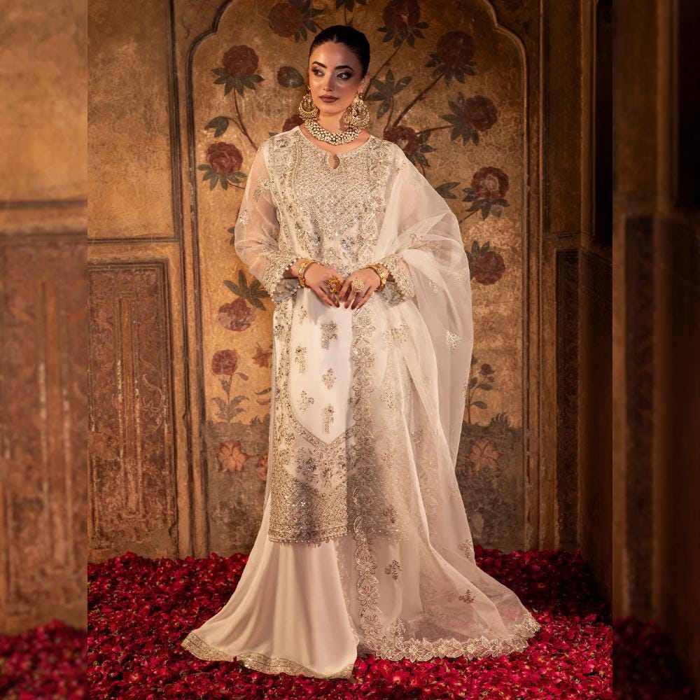 green emerald velvet dress Gazala- Pakistani Nikkah Dresses In Toronto, Canada – Karigur main image 0