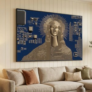 May include: A large framed artwork depicting a religious figure in metallic tones against a blue circuit board. The artwork hangs above a beige sofa with cushions. The figure is surrounded by a halo, creating a striking contrast.