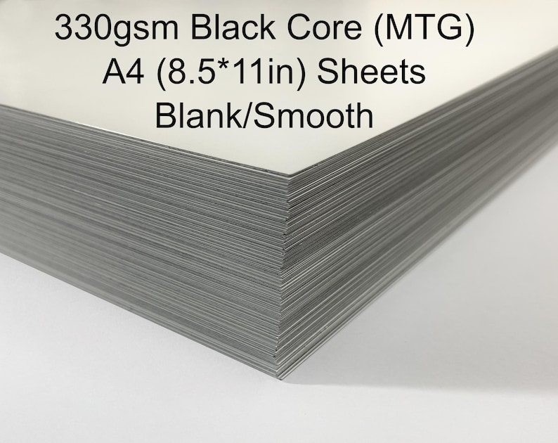 May include: A stack of A4 (8.5*11in) blank, smooth sheets with a 330gsm black core. The sheets are stacked neatly, with the edges visible. Text on the image reads: "330gsm Black Core (MTG) A4 (8.5*11in) Sheets Blank/Smooth."