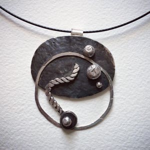 Abstract sterling silver pendant, selectively oxidized
