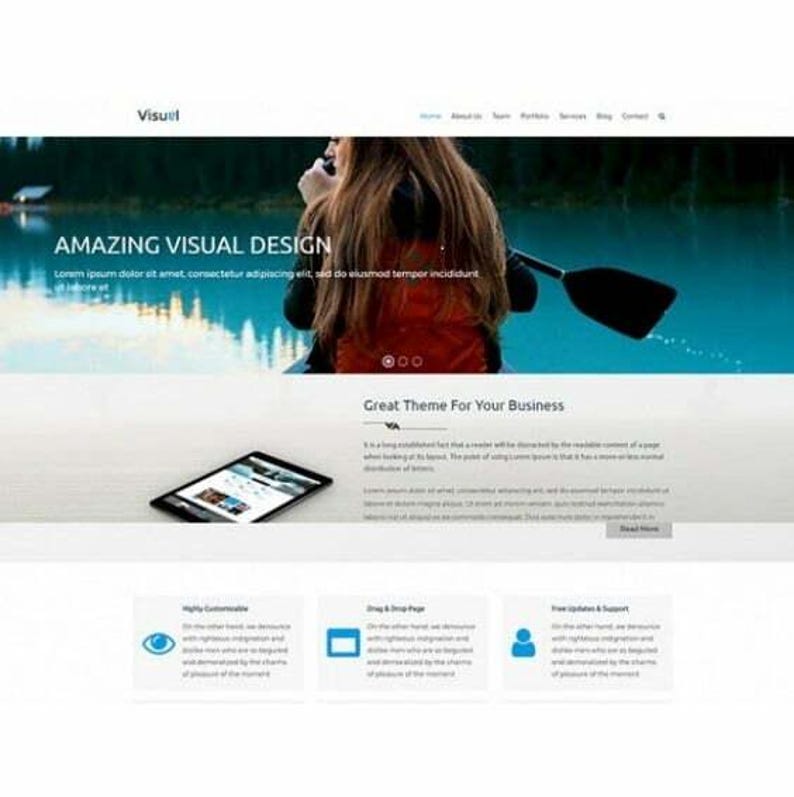 May include: A website landing page layout featuring a header with the text Visuel, a hero section with a person holding a paddle in front of a lake, the text AMAZING VISUAL DESIGN, a tablet displaying a webpage, and three feature boxes below.