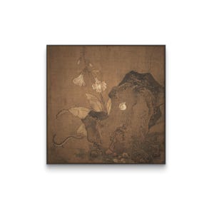 May include: A framed print of a traditional Asian painting. The artwork depicts a detailed botanical scene with a flowering plant, a rock formation, and a moon-like element. The color palette is primarily brown and beige.