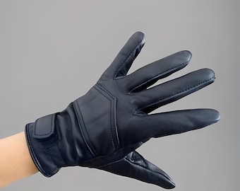Guantes elegantes de piel de oveja suave, diseñados para brindar estilo y comodidad. Guantes de cuero genuino, guantes de invierno y guantes de conducción.