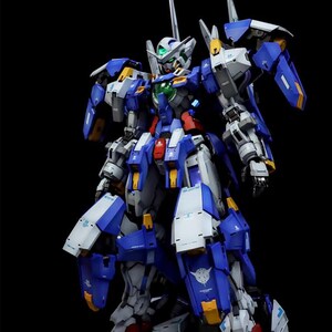 May include: A detailed model of a blue, white, and gray mecha robot with yellow and red accents. The robot has a complex design with multiple articulated parts and a long antenna. The AeroModelBuild logo is in the top right corner.
