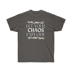 May include: Dark grey t-shirt featuring the white text "LET YOUR CHAOS EXPLODE", with flame-like decorative elements. The shirt has a crew neck and is made of a soft fabric.