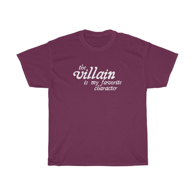 May include: Burgundy t-shirt with white text that reads "the villain is my favorite character"