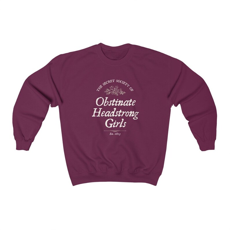 May include: Burgundy sweatshirt with a white graphic that reads "The Secret Society of Obstinate Headstrong Girls Est. 1813".