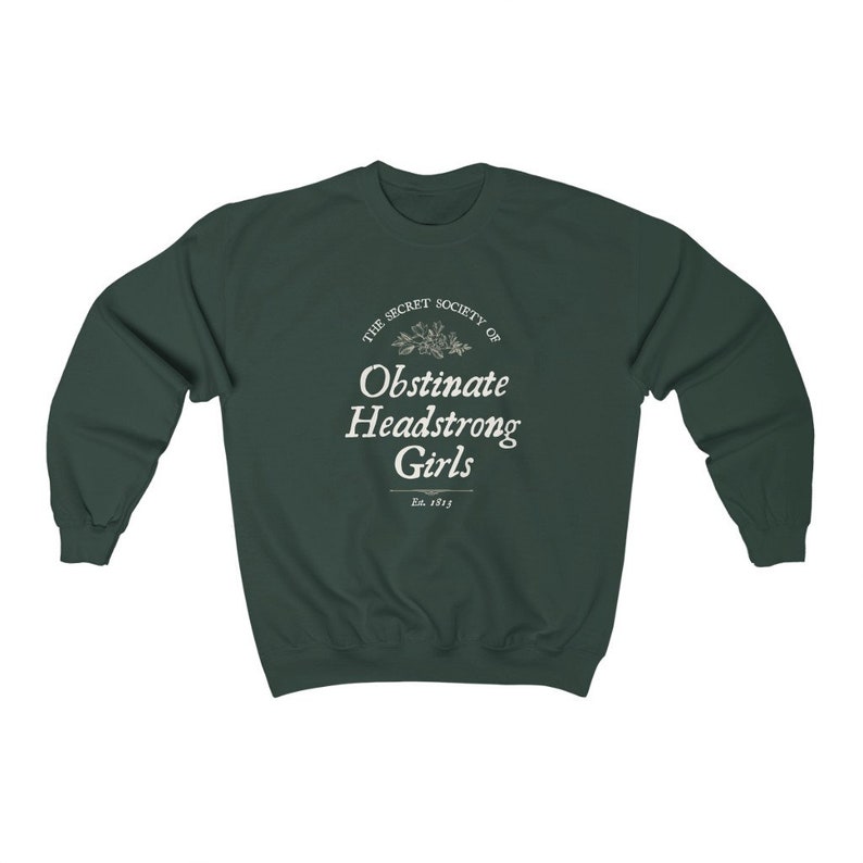 May include: A dark green sweatshirt with a white graphic print that reads "The Secret Society of Obstinate Headstrong Girls Est. 1813".