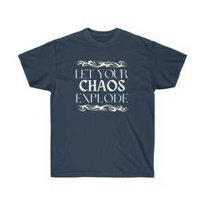 May include: Dark blue t-shirt featuring the white text "LET YOUR CHAOS EXPLODE", framed by flame-like patterns. The shirt has a crew neck and is a solid colour.