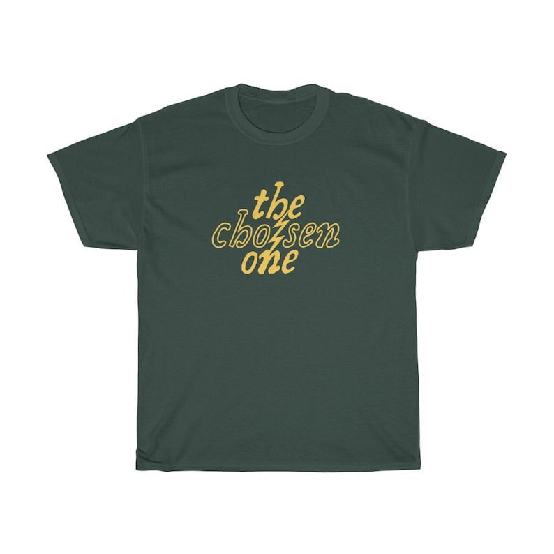 May include: A dark green t-shirt with the text "the chosen one" in yellow.