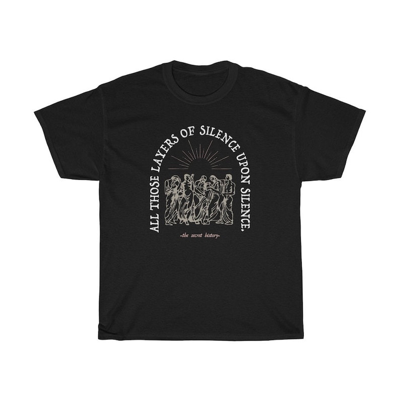 May include: Black t-shirt with a white graphic print of a group of people standing in a circle with the text "All those layers of silence upon silence -the secret history- "