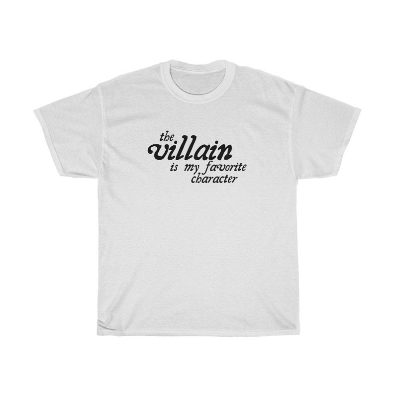 May include: White t-shirt with black text that reads "the villain is my favorite character"