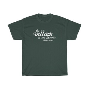 May include: A dark green t-shirt with white text that reads "the villain is my favorite character".