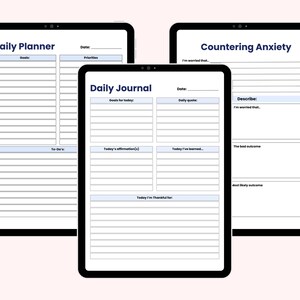 May include: Three black tablets displaying digital planner pages. The tablets show the titles "Daily Planner", "Daily Journal", and "Countering Anxiety". Each tablet has a white background with blue text and lines for writing.