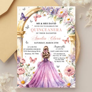 May include: A Quinceañera invitation featuring a watercolor illustration. The invitation includes the text "MR & MRS DAVID INVITE YOU TO CELEBRATE THE QUINCEANERA OF THEIR DAUGHTER Amelia Clara SATURDAY, MARCH 25TH". The design incorporates floral and butterfly elements.